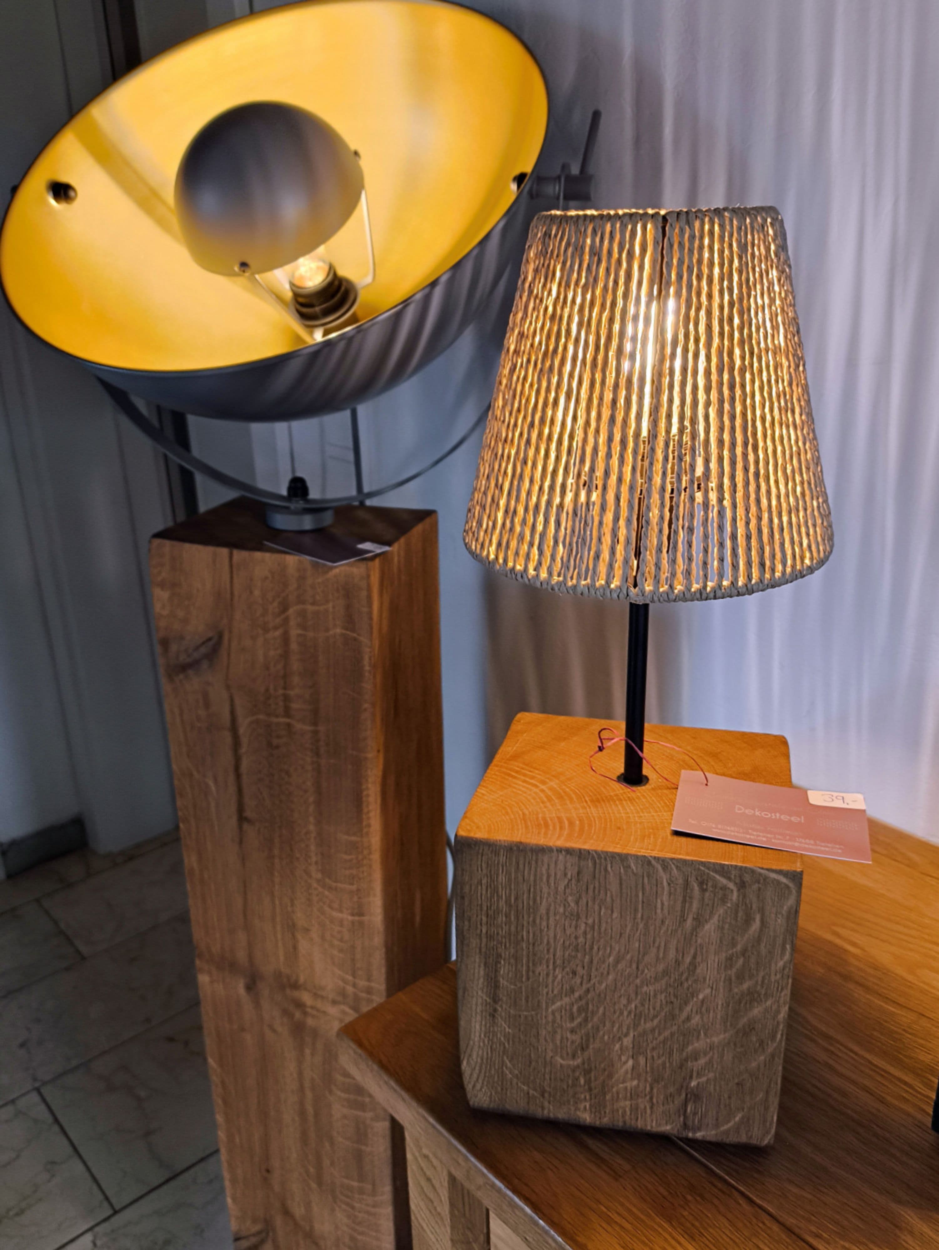 Einzigartige Wohnaccessoires aus Altholz und Edelstahl | Symbolbild